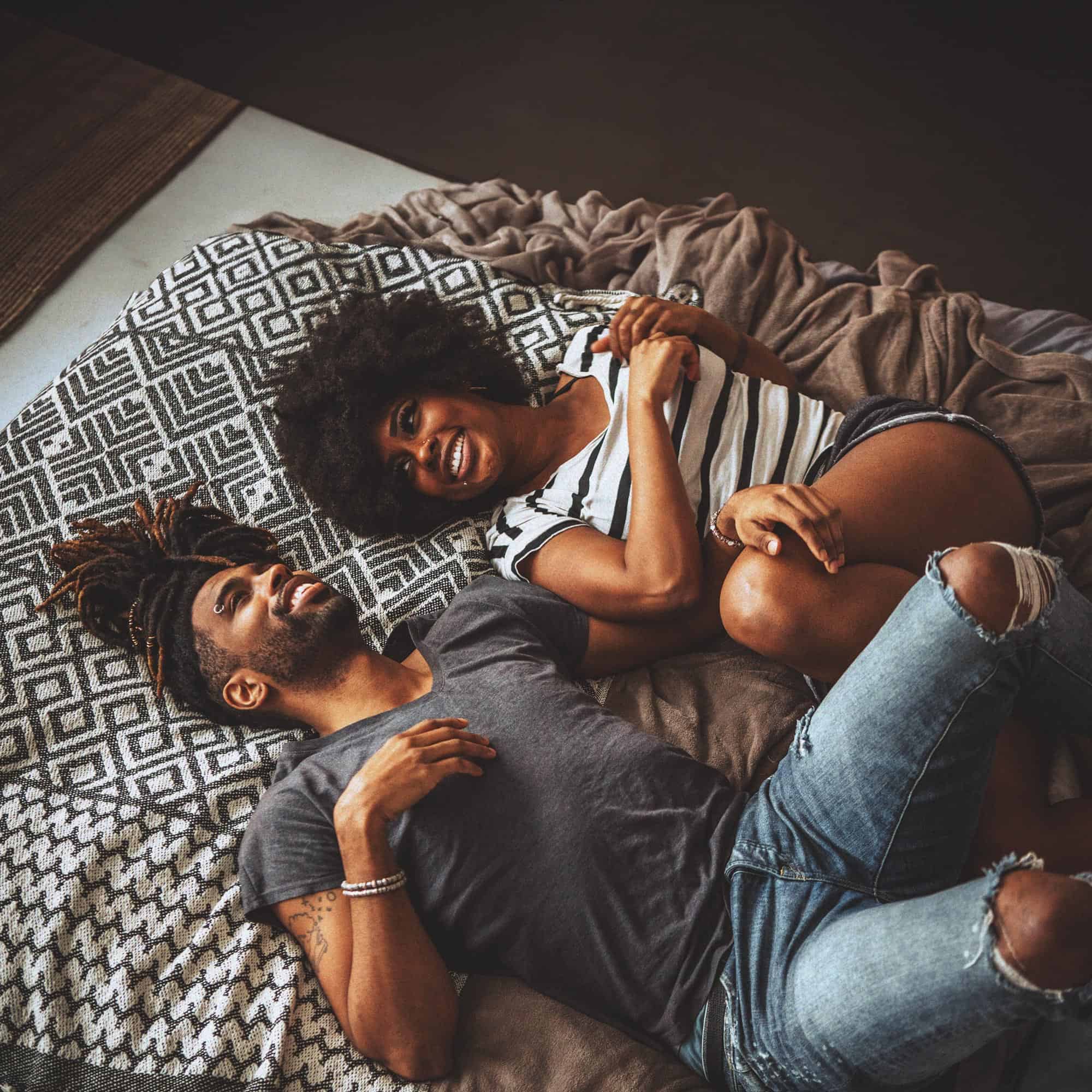 A man and a woman discuss several communication exercises for couples