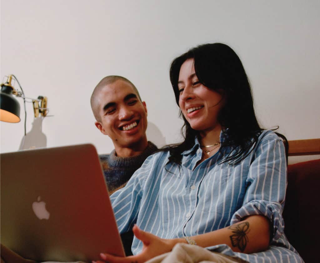 a couple working through a relationship worksheet together online